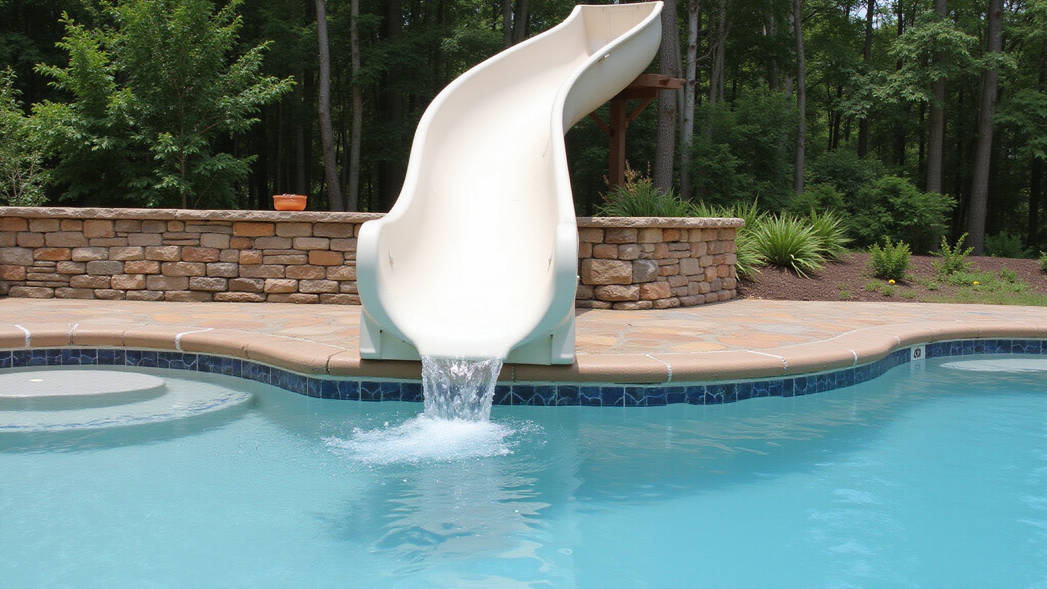 pool grotto waterfall slides